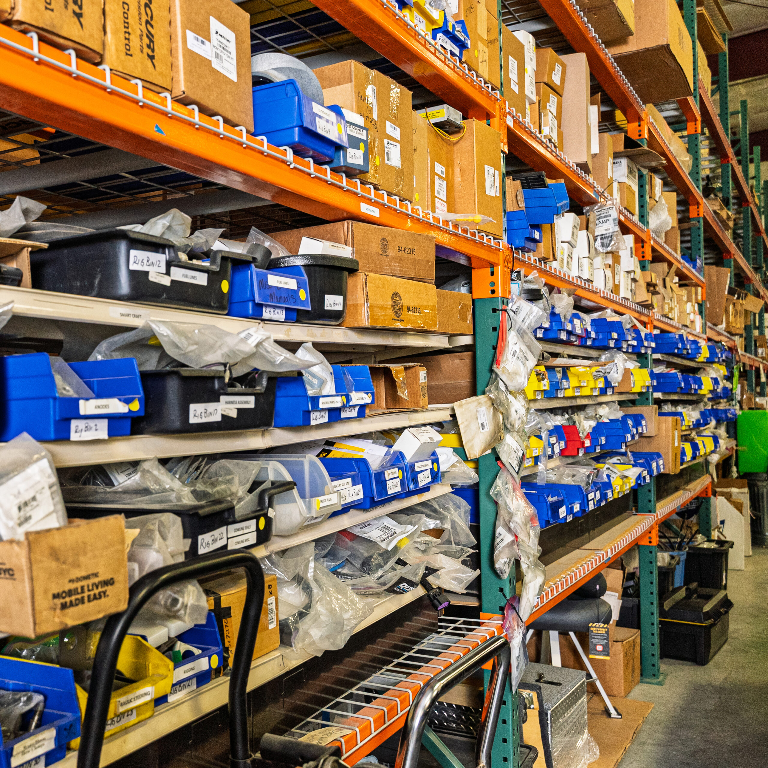 Organized storage shelves with labeled boxes