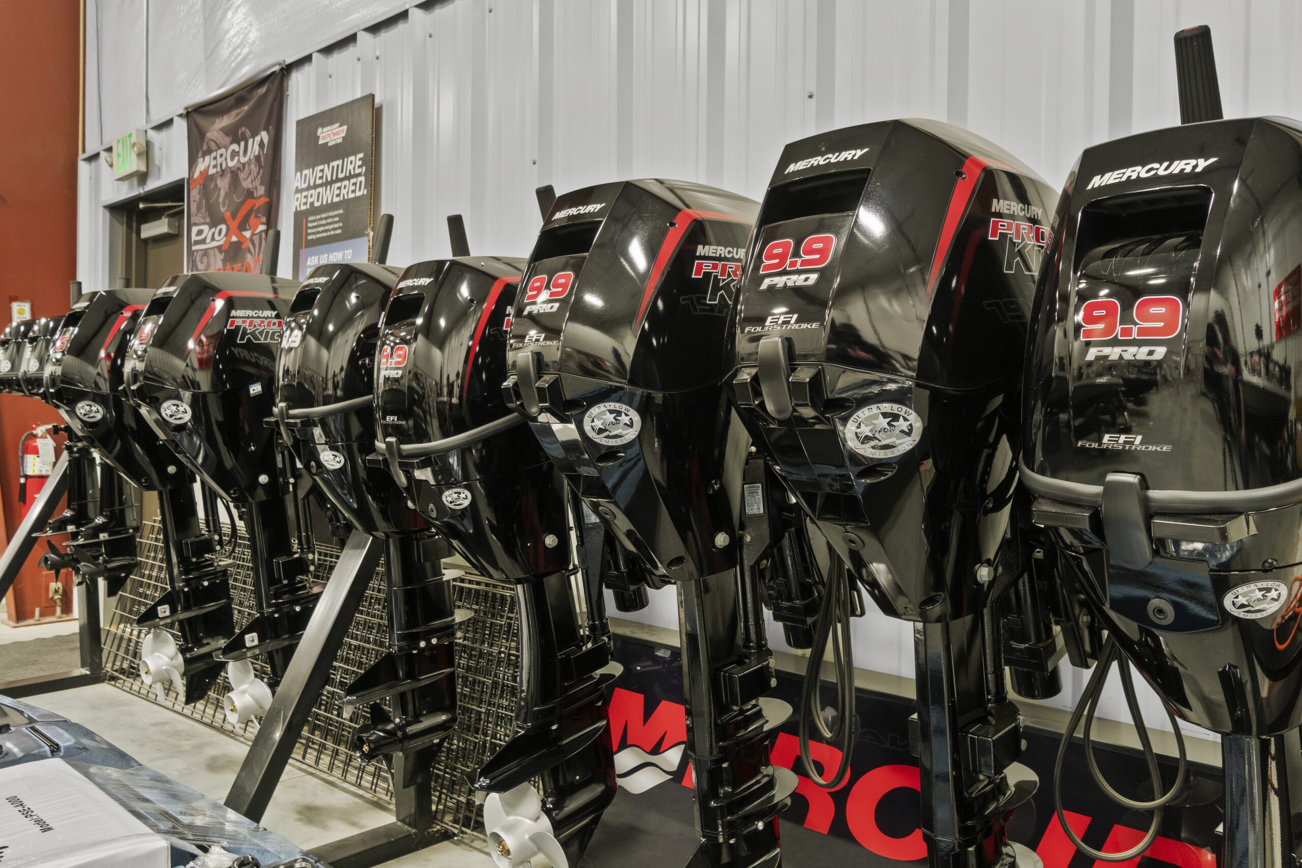 Row of Mercury boat outboard motors