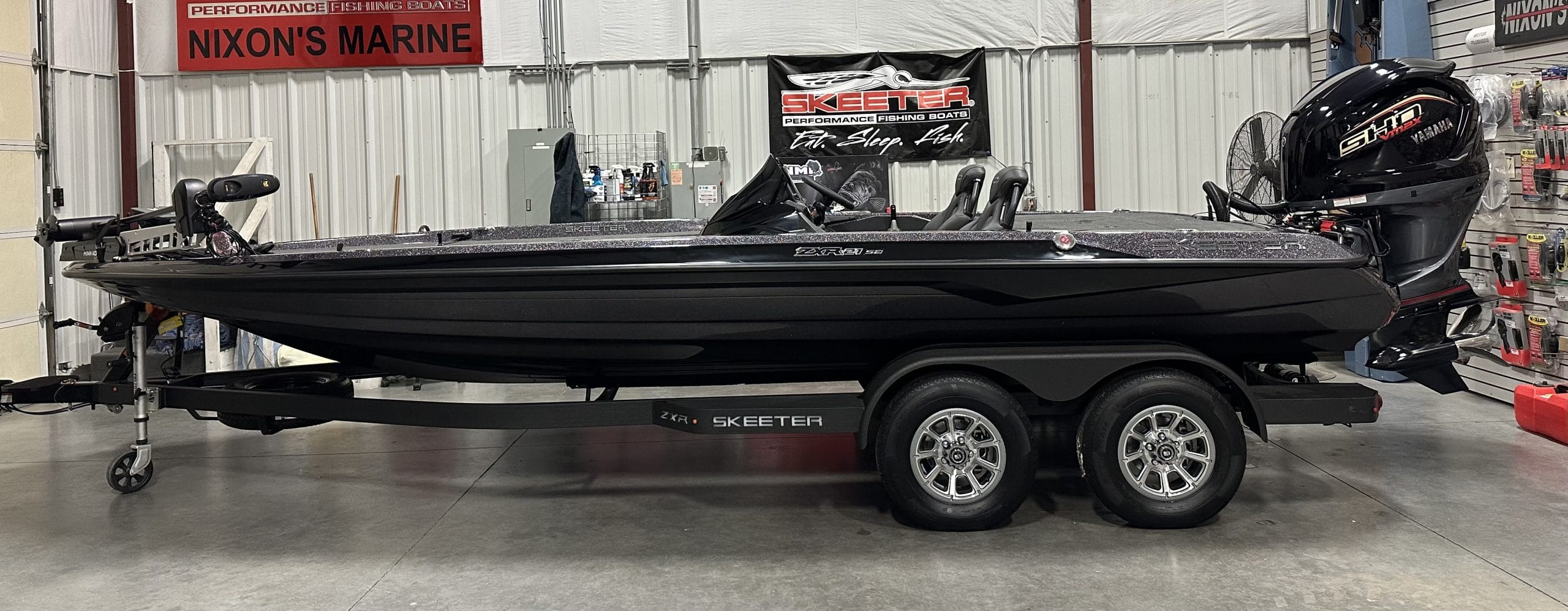 Black Skeeter bass boat on a dual-axle trailer